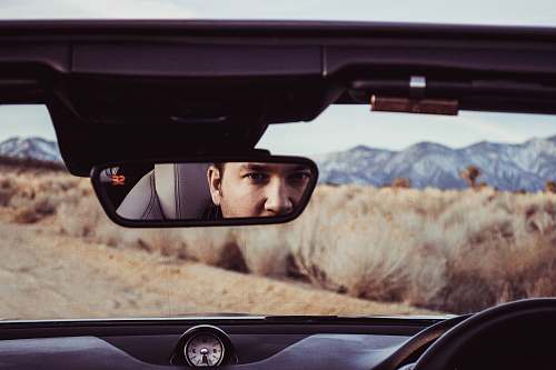 car mirror person staring at rear view mirror pearblossom
